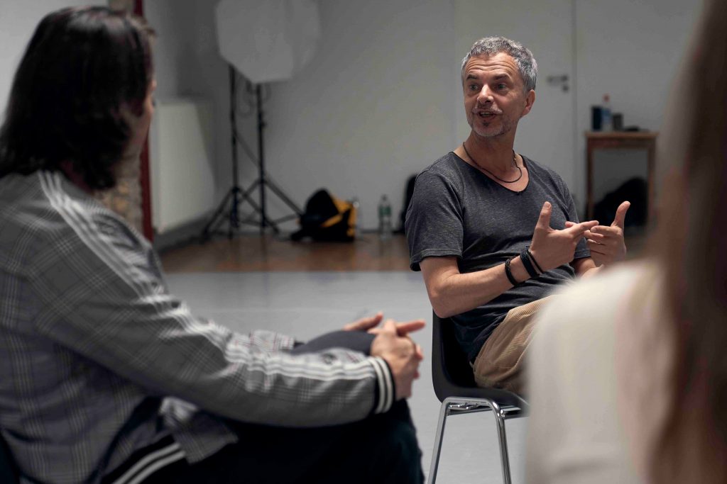 Professional team development session with improvisation techniques